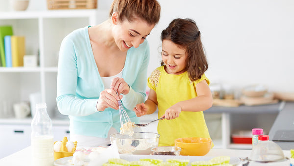 A pretty yellow helping to her mom with love